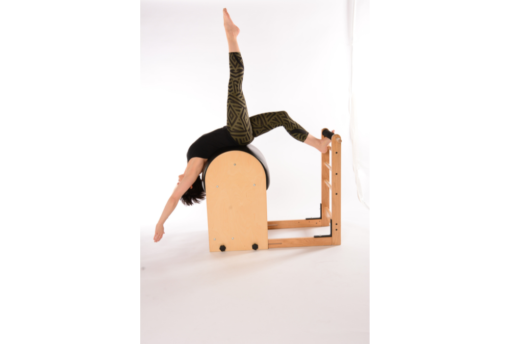 Side Stretch Over Leg Pilates Ladder Barrel